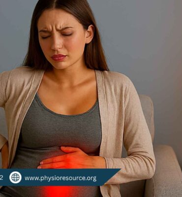 Young pregnant woman seated on a sofa in a softly lit bedroom, gently pressing her lower abdomen and back with red glow indicating early pregnancy pain areas.