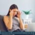 Young woman holding her head in pain, with one side highlighted to depict migraine symptoms
