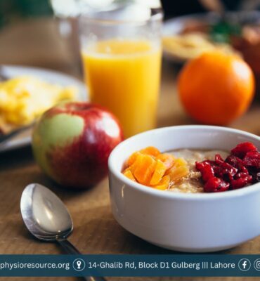 Bowl of oatmeal topped with fruits, seeds, and nuts—an underrated high-fiber breakfast option