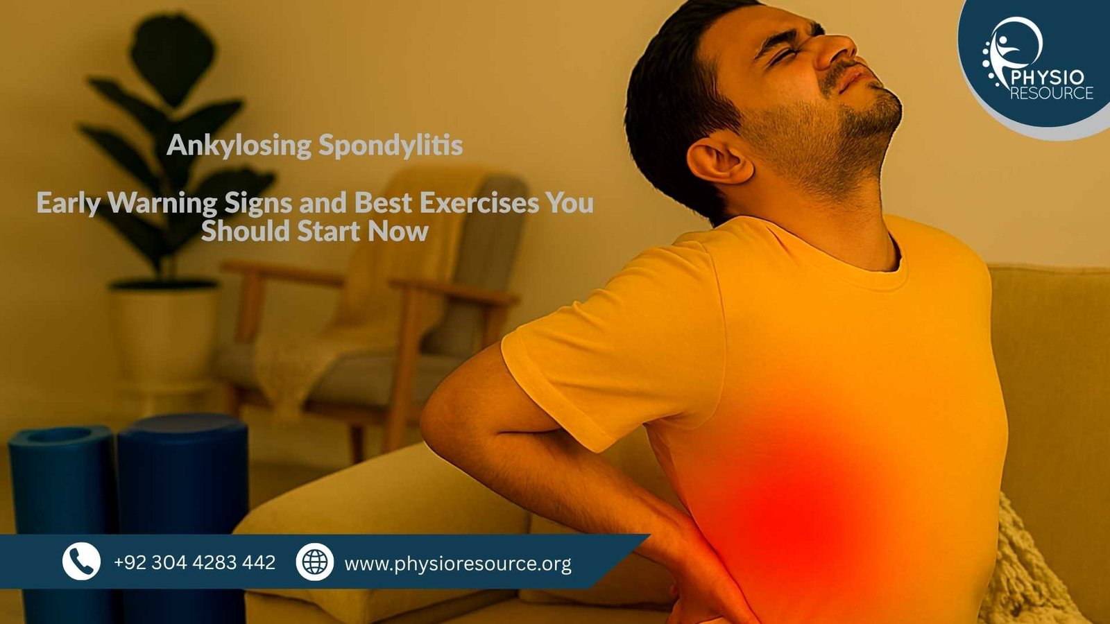 Pakistani male seated on a beige sofa, pressing his lower back with visible discomfort. A red glow highlights the pain zone. A yoga mat and foam roller are nearby in a warm, culturally authentic indoor setting.