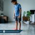 Child with flat feet standing barefoot showing low foot arch and experiencing foot pain during summer, Physio Resource Lahore