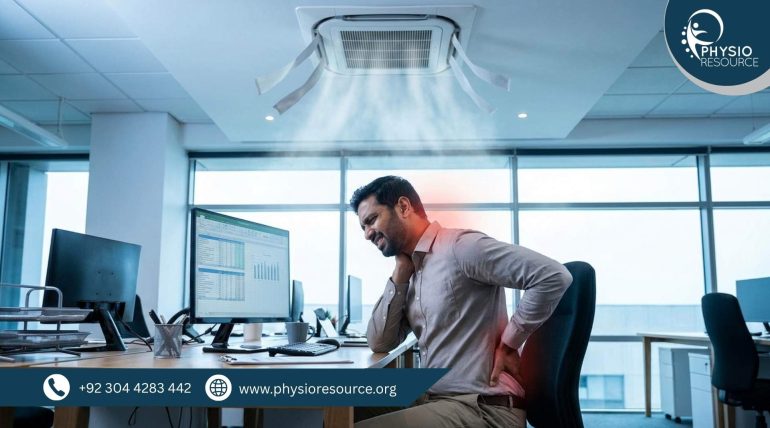 Office worker sitting under air conditioning experiencing neck and back pain due to poor posture and cold exposure, highlighting physiotherapy care at Physio Resource Lahore