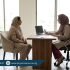 Pakistani woman discussing pelvic floor physiotherapy with a female physiotherapist in a modern clinic – Physio Resource