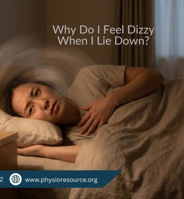Person lying on a bed at night with a slightly uncomfortable expression, experiencing dizziness while resting